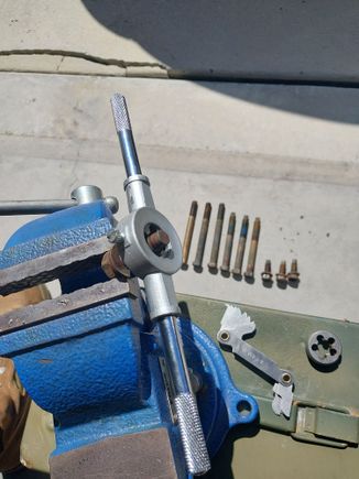 I ultrasonic cleaned all the bolts in white vinegear since it's cheaper than a gallon of WD-40 or evaporrust. I then took them out and chased all of the threads. I am probably going to replace these, but I think I am going to use them to moc the whole thing up first before I buy more hardware.