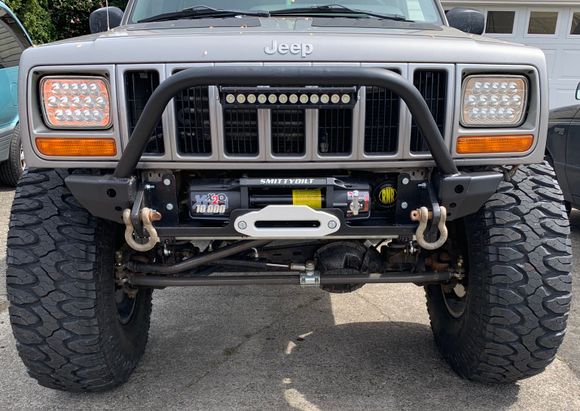 Reilly used Ares Fabs modular bumper ends on his installation. These will bolt right onto the stock bumper mounts and there are several styles available.
https://aresfabrication.com/model/xj/bumpers-xj/
