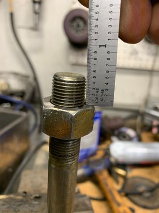 Next reinstall the extra nut to the length that you want to cut off the extra bolt length. I go about a 1/4” away from the hole.