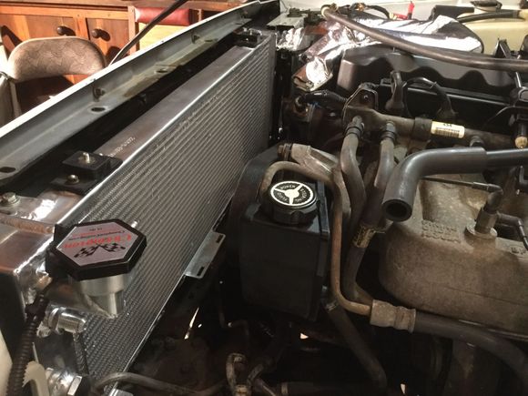 New champion rad,condenser finally bolted into place.