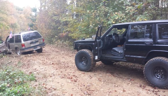 When a buddy decides it's a good idea to go wheeling alone in a two wheel drive ford explorer with bald tires in the Georgia clay. On the bright side got to use the winch for the first time!