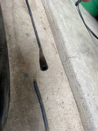 If you zoom you can see that one side of the tubing is worn so flat that it wore into the center. 