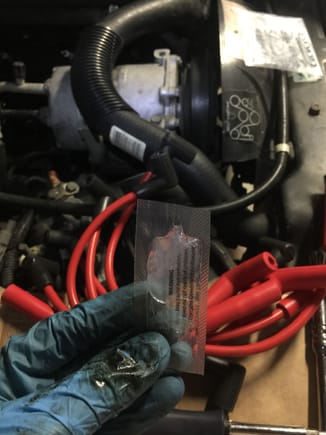 The tune up kit came with a little pack of dielectric grease to squeeze inside the boot of the ignition wires.