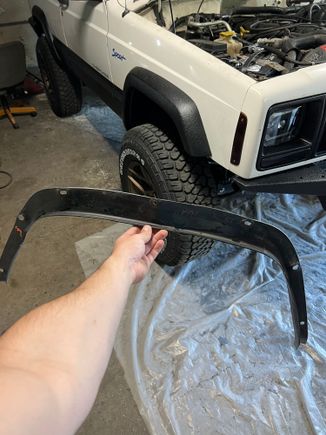Found a fender flare liner for the passenger rear at the junk yard. 