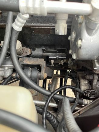 XJ coil bracket