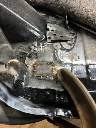 For this patch I used the “cut and butt” method. A patch is lapped over the damaged area and tacked in, then the edges are cut, pressed in flush and tacked a little at a time until the entire piece is flush. 