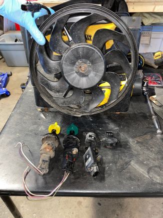Went for a junkyard run. Scored a couple speed sensors, TPS, MAP sensor, IAC valve, and a spare E-fan. 