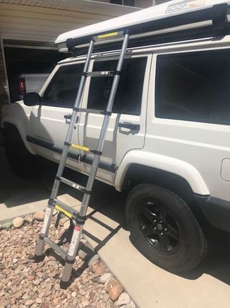 Roofnest ladder hooked into aluminum bar, instead of the nest.  It's more secure and lockable.