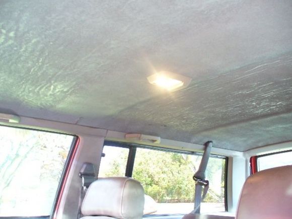 fixed the headliner, but its not cloth, its primer spray paint, Will Never Sag Again!