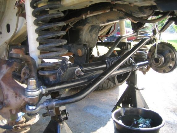 shimming my brand new custom axle because they did it wrong!  The shims were just loose and falling out?  Wow.  That wire to the locker makes it hard to do anything with the gear set.