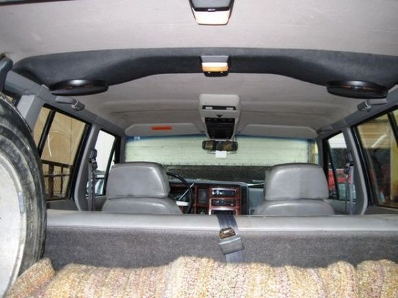 Originally installed in the rear cargo area. I moved it up to just forward of the rear Shoulder belts and was surprised that I did not gain much amplitude for the front seat passengers. I did gain an extra dome light in the deal though...