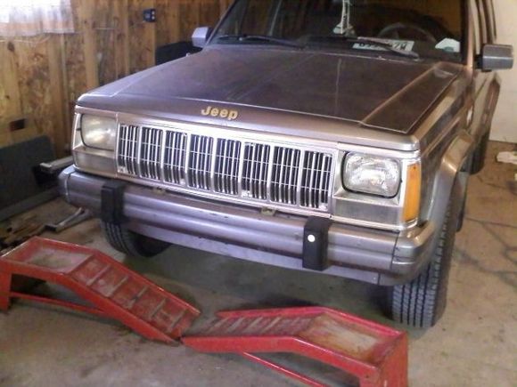 Shiny new chrome paint on the grille and bezels! Plus my driver's side headlamp has the new adjusting screws so it actually points up instead of straight down at the ground! Those stinkin little plastic clips they screw into are a son of a gun to get in there!