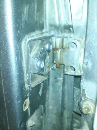 Upper hinge after cutting, aligning and re-installation.