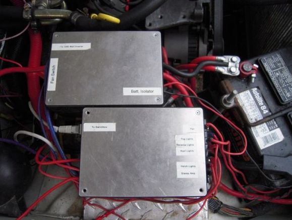 These are the relay and fuse boxes connected to the switch box inside.  Everything inside (fuses, relays, etc.) is labeled for the next owner, as well as my poor memory.  The top box holds the solenoid to include/exclude the secondary battery and disconnect it when the engine isn't running.