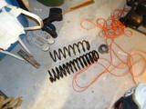 stock coil with spacer next to new 4.5inch coil