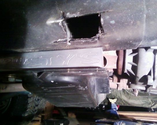 and this is how i got the nut plate out.....i was frustrated and had a grinder, and kinda got out of control....gonna weld a plate over it at some point.....lol