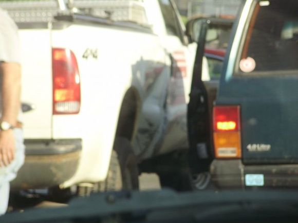 I witnessed this accident on the way home from work, the yahoo in the truck went to make a r ight hand turn from the left lane. Notice the jeep is unscathed, wow this was almost me........