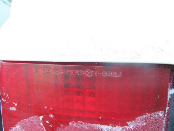 This is a picture of my driver side tail light. Looks like they were still using the '83 covers on the '87.