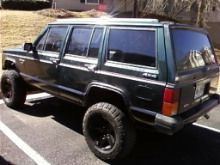 Rubicon Rims painted black and 31 mtrs on a 3" lift.