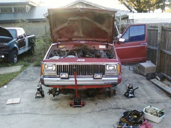 Front end on the ground, So we could work on the engine with ease, Im 6ft2, and i ususaly need a small ladder.
Or i Climb on the tire.