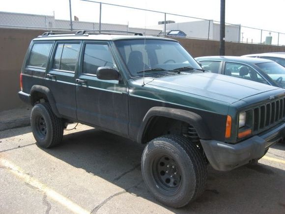 The jeep with huculiner and my daily driver in the background.