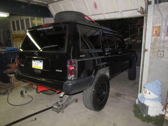 Jacking her up to plug a tire