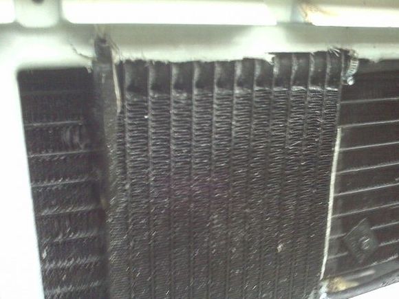 the cooler is nice and thick so i had to cut a little of the fiberglass for it to fit.