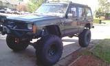 my jeep in the driveway after putting the new lift and tires on it.