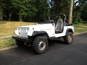 My friends 91 wrangler. We took the windshield off to replace it, but had to go for a ride willys style