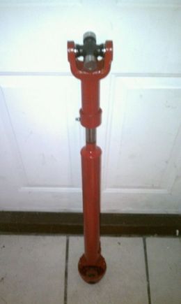 Freshly painted and balanced front driveshaft with new Moog u-joints.