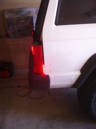 Euro-spec taillights legal now with an LED strip hard wired to existing running lights