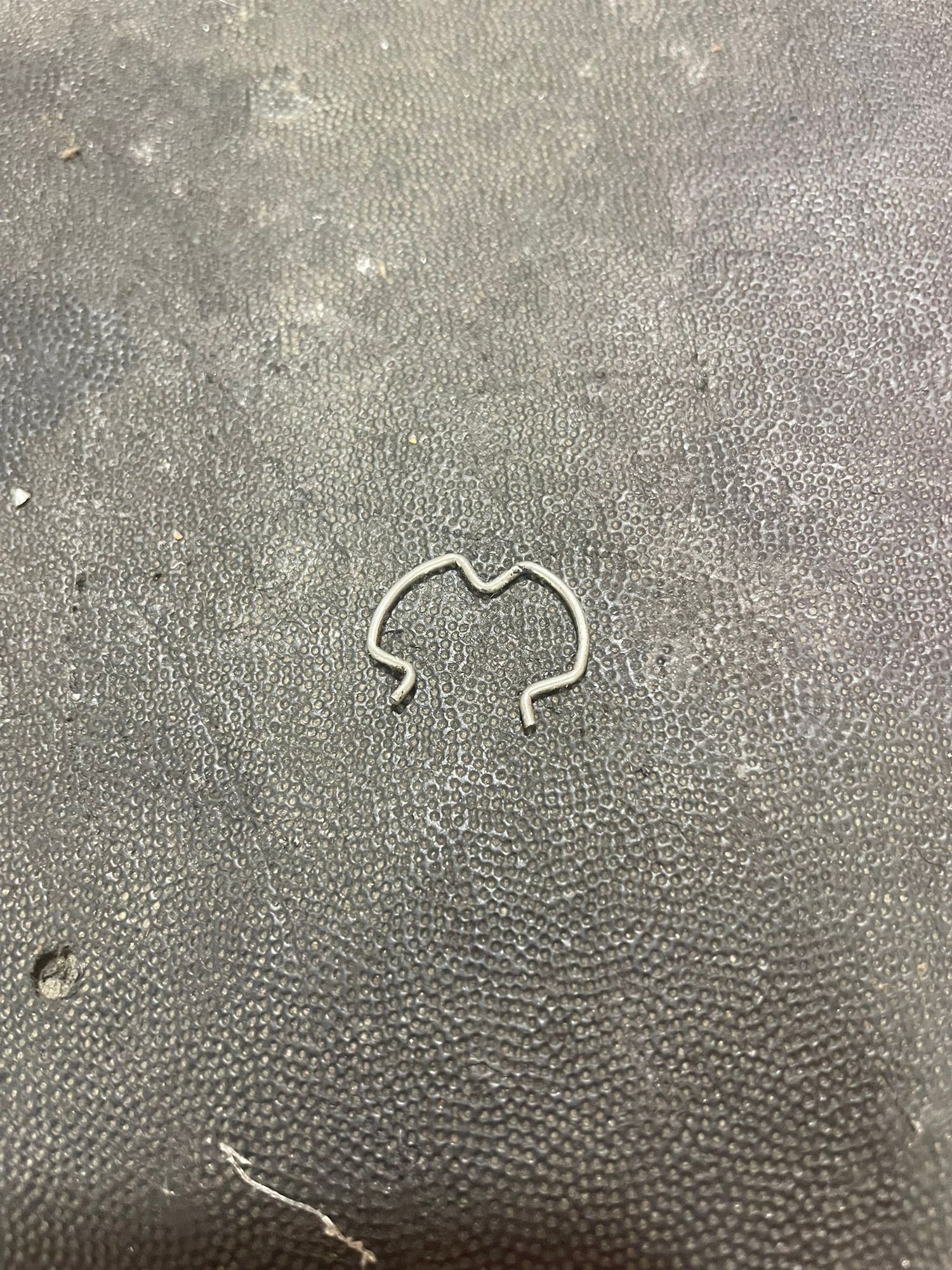 This is a Jesus clip, and holds the cooler line into the radiator. Have extra on hand, you will lose at least 1.
