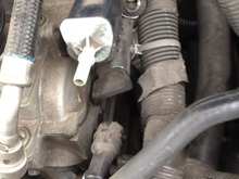 There the grey piece with the hose bib, it should be closed