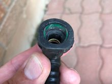 This is the EVAP canister end of the vapour line , you simply squeeze the flat area and the rounded area gently together with pliers and remove from the plastic  tube it’s attached to