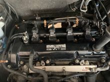 Here’s a photo of the black valve cover, Thanks to the_shmoo