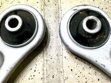 One bushing is actually broken.  Both are severely worn after one year of service.  