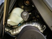 The air intake duct, commonly referred to as the woolly worm can be taped up, replaced with metal dryer vent flexible tubing . Part number Genuine GM 15865168 Air Intake Duct, Front be prepared for sticker shock they are expensive. 