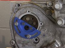This lisle tool , shows how it holds the water pump gear in place , this way the balance shaft chain is held in position, and you don’t have to remove the front cover. 