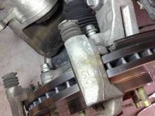 Larger diameter rotors will hit the bracket as shown here there isn’t much space