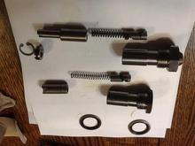 The hump version is for the 2.0, 2.2, 2.4 with VVT on the top
The flat top version is for the 2.2 non VVT on the bottom 
The part on the right end of each spring is the release mechanism when you tap the chain shoe to activate it 