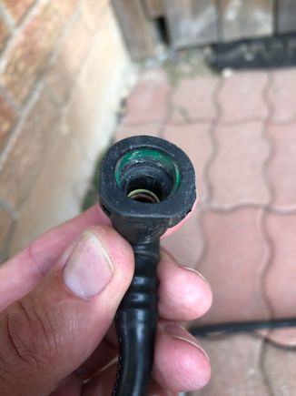 This is the EVAP canister end of the vapour line , you simply squeeze the flat area and the rounded area gently together with pliers and remove from the plastic  tube it’s attached to