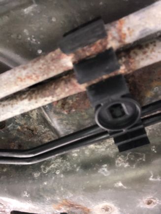 This is the clip under the drivers foot well both lines had corrosion in both cars. 