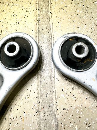 One bushing is actually broken.  Both are severely worn after one year of service.  