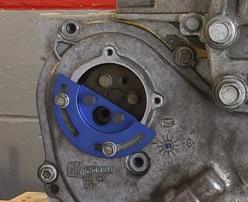 This lisle tool , shows how it holds the water pump gear in place , this way the balance shaft chain is held in position, and you don’t have to remove the front cover. 