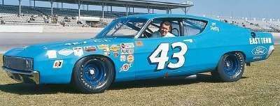 1969 Ford Torino Talledaga , note the front grille and bumperstretched forward several inches

In search of downforce and aero dynamics