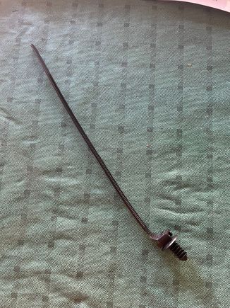This is the only zip tie I could find that will work. Grind down the pine tree at the end until it will screw into the threaded holes easily, using lithium grease.
