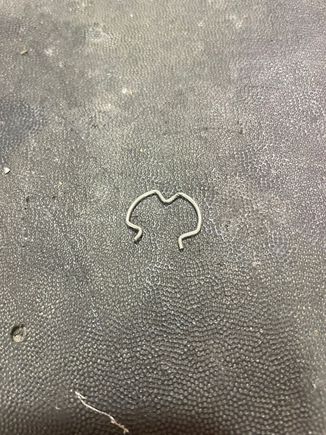 This is a Jesus clip, and holds the cooler line into the radiator. Have extra on hand, you will lose at least 1.