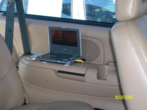 Rear Portable feeds the roof mounted Screen and sound is through infra red earphones.