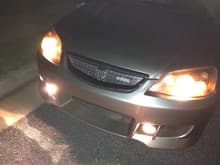 Aftermarket front end, grille, headlights and fogs. Not sure where it came from (previous owner did it) but the it took me a year to finally fix the driver's side fog. At night you can't see the paint scratches and rust spots :)