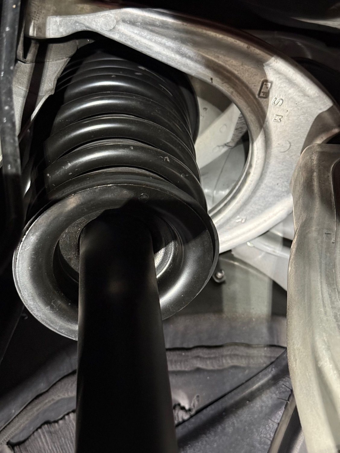 Passenger side spring for comparison